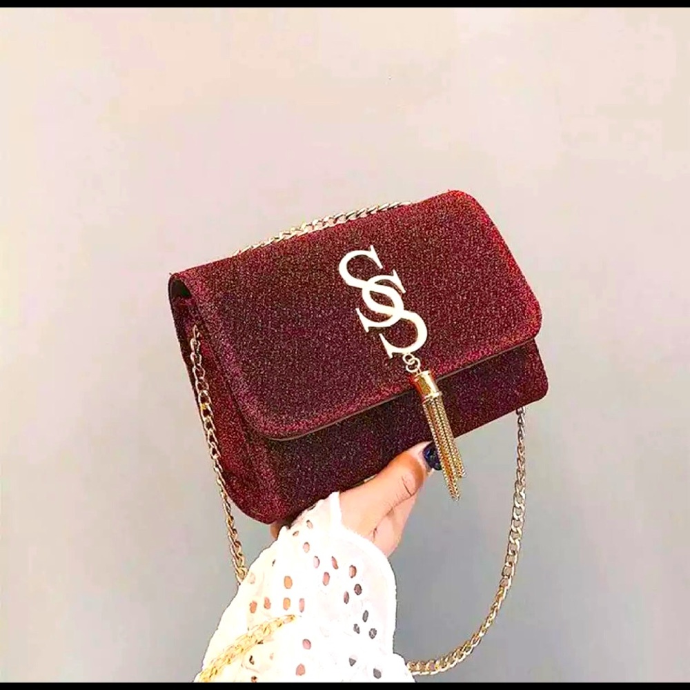 Brand new fashionable double S tassel sling bag